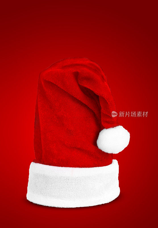 圣诞老人的红帽子。孤立的红