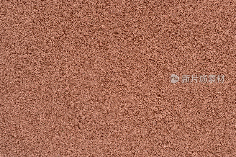 粗糙的灰泥墙涂成棕色