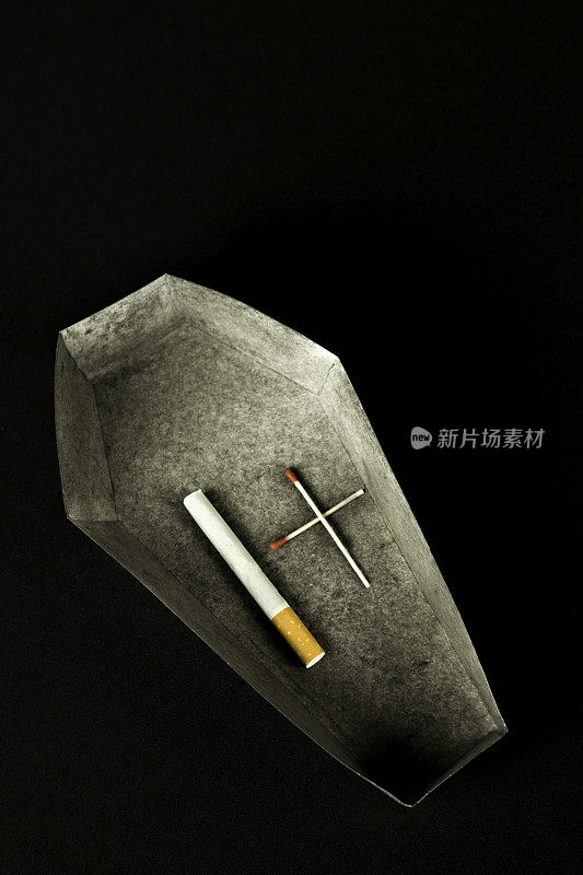 棺材里的香烟戒烟的概念图像
