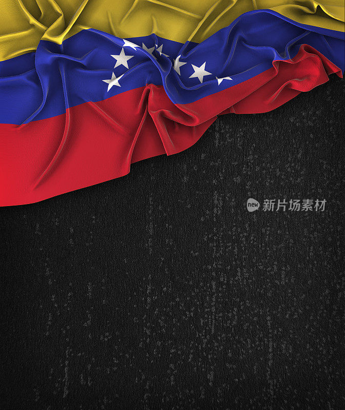 委内瑞拉国旗Vintage在一个Grunge黑色黑板与文字空间