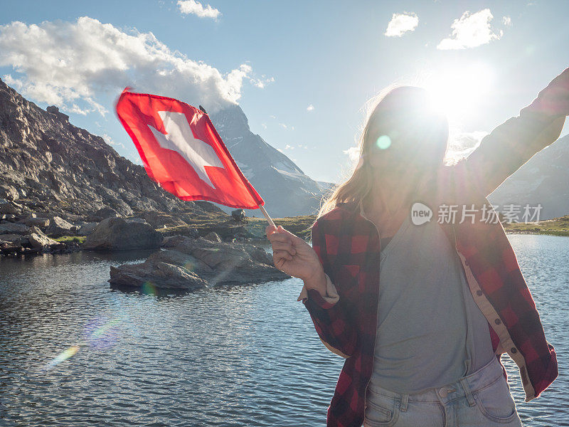 泽马特，一个拿着瑞士国旗的女人