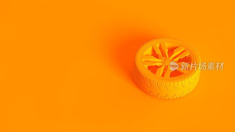 概念上的立体图像。汽车车轮孤立在橙色背景。