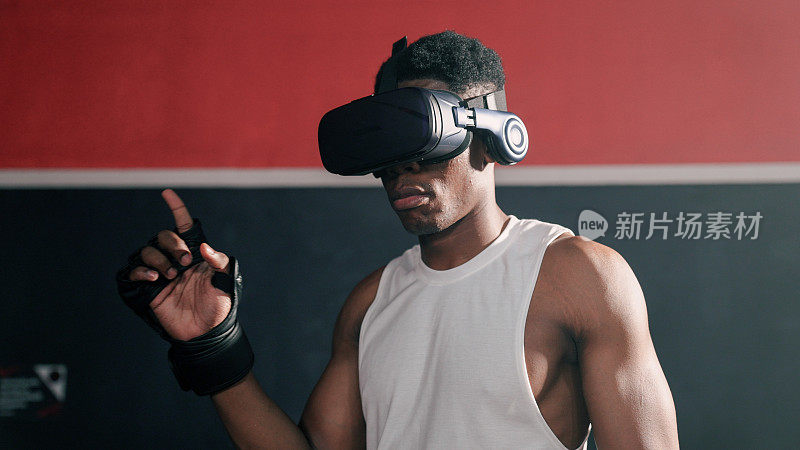 非洲男子在拳击赛前戴上VR头盔。