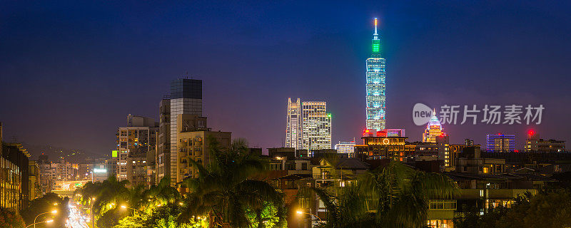 台北霓虹灯夜摩天大楼天际线照亮拥挤的城市全景台湾