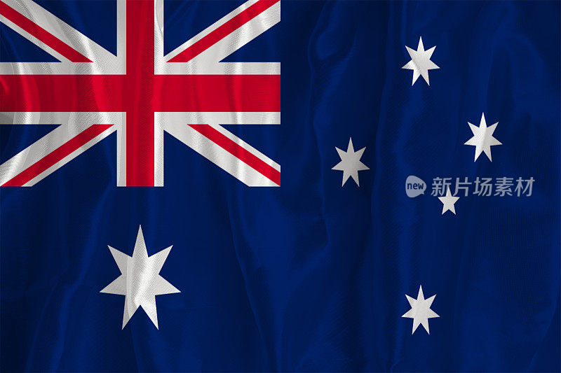 以丝绸为背景的澳大利亚国旗是一个伟大的国家象征。国家的官方国家象征。澳大利亚国旗的背景