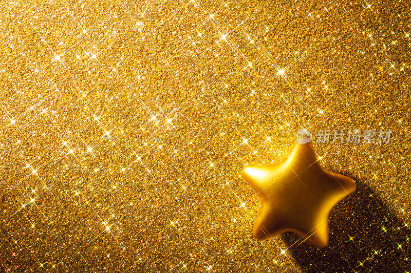 金色圣诞之星-闪耀背景纪念日金