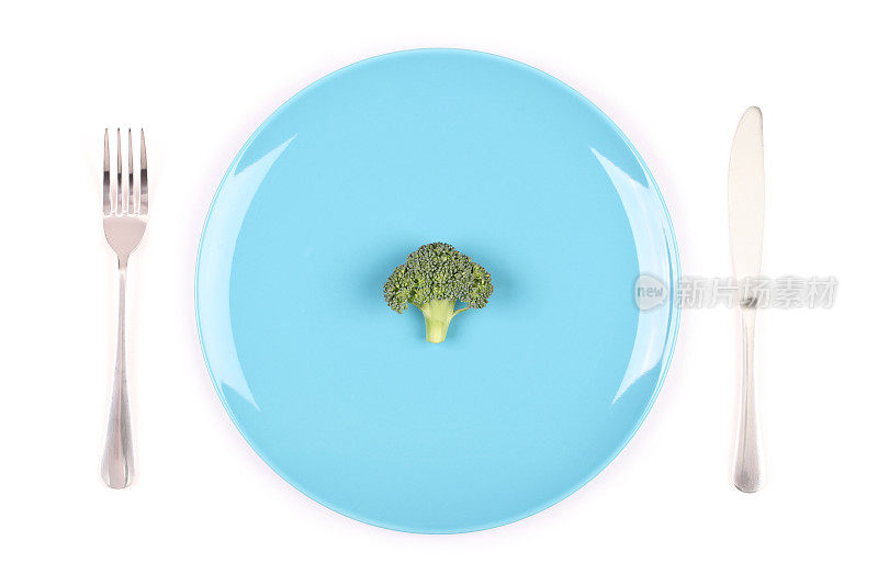 一顿用蓝色盘子盛一根花椰菜的减肥晚餐