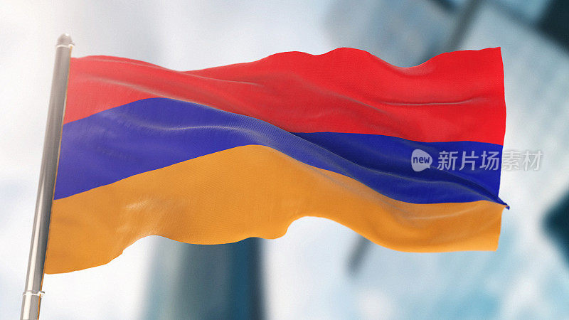 亚美尼亚国旗对抗散焦城市建筑