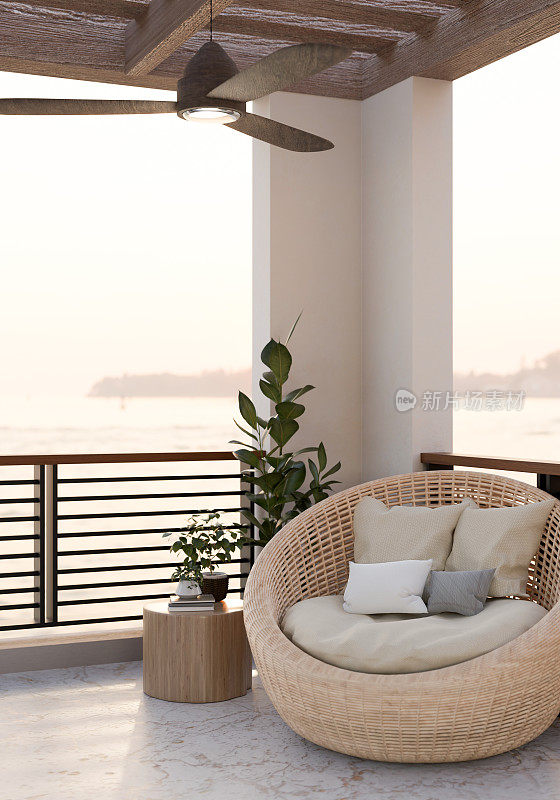 一个舒适的室外阳台休息室设有柳条躺椅与枕头，和一个自然景观。