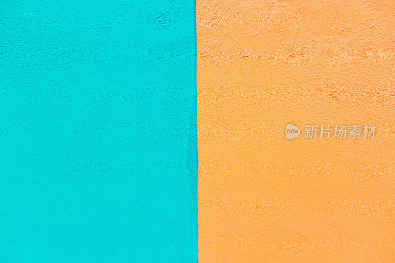 墨西哥:充满活力的墙壁背景纹理:绿松石和橙色