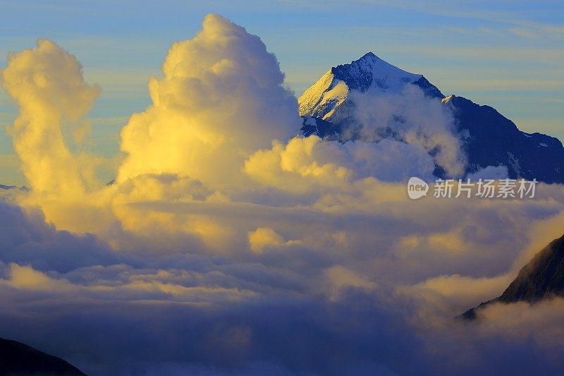 田园诗般的勃朗峰阿尔卑斯景观日出之上的云和山谷