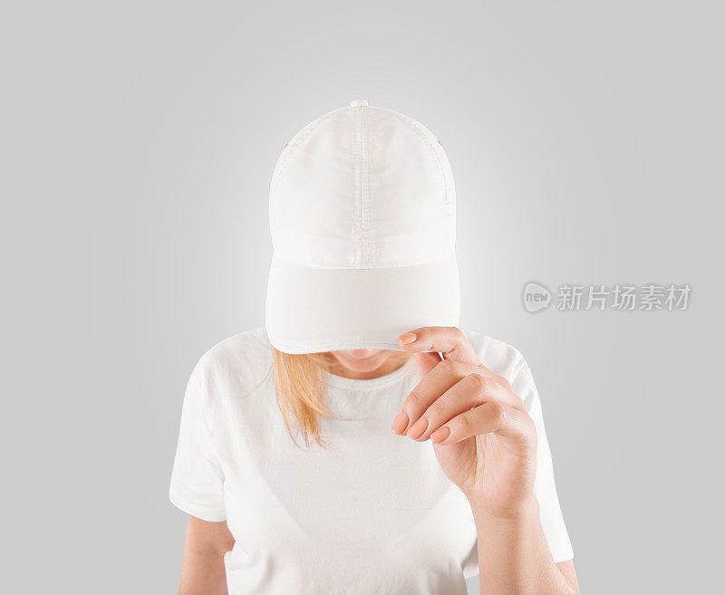 空白的白色棒球帽模型模板，戴在妇女的头上