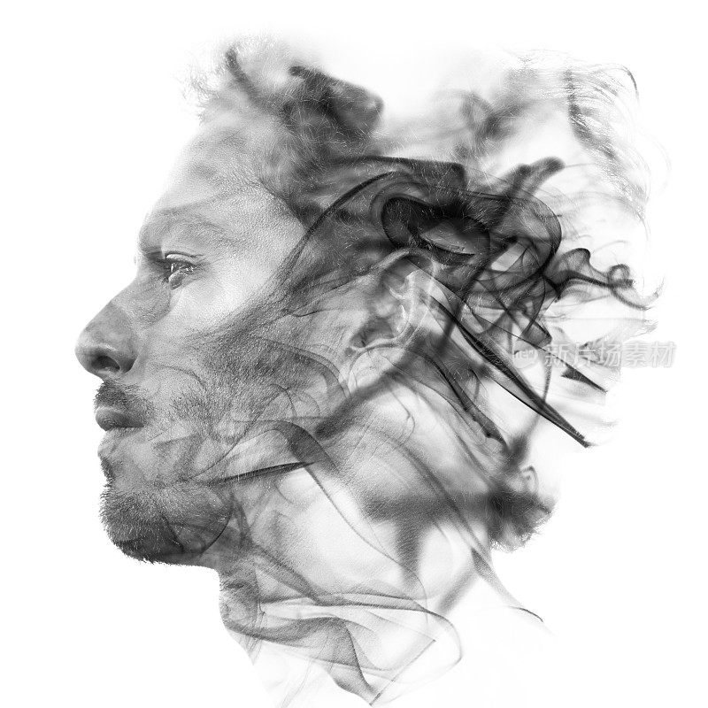 双重曝光的肖像，一个性感的男性与黑色的特征融合在一幕烟雾