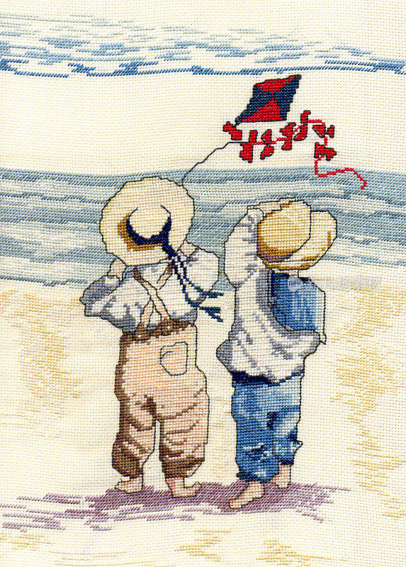 孩子们在海滩上放风筝