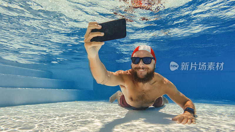 搞笑男子水下自拍手机:网瘾