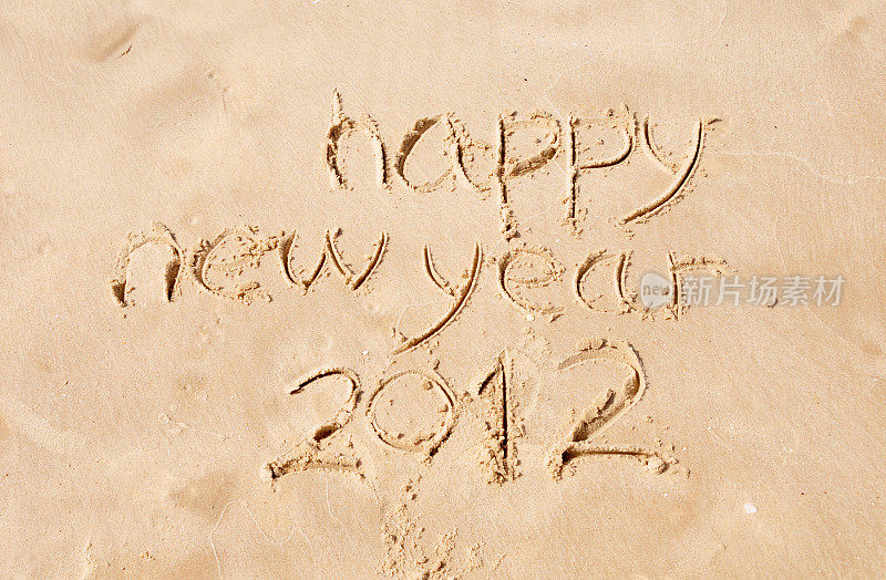 在沙子上写着2012年新年快乐