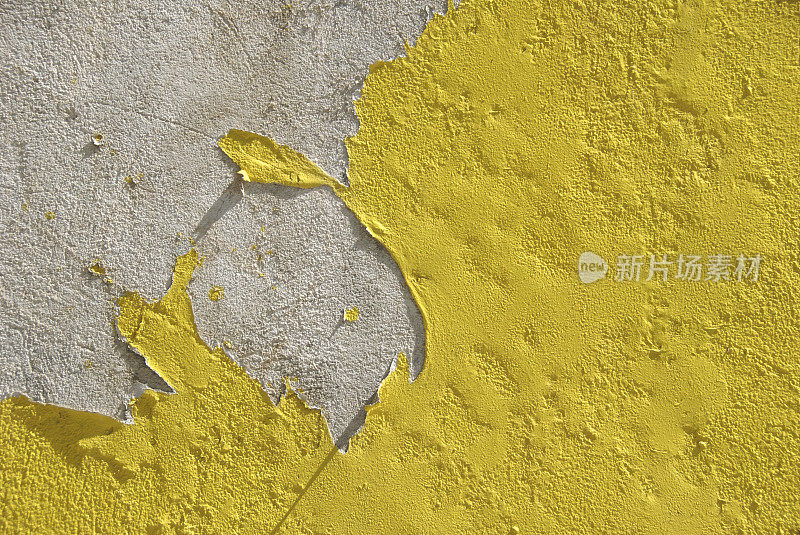 墙壁黄色油漆剥落背景