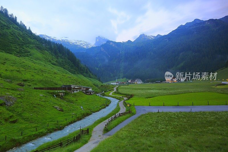 阿尔卑斯奥地利村庄，河流和雄伟的齐勒塔尔，蒂罗尔雪山全景和田园诗般的蒂罗尔山谷草甸，奥地利