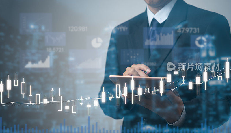 商人分析图表股票市场和财务，投资策略和数据报告增长。