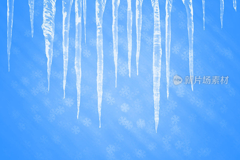 蓝色雪花背景上的冰柱