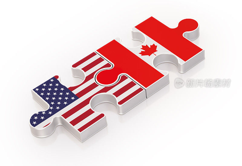 用美国和加拿大国旗制作的拼图;团队合作理念