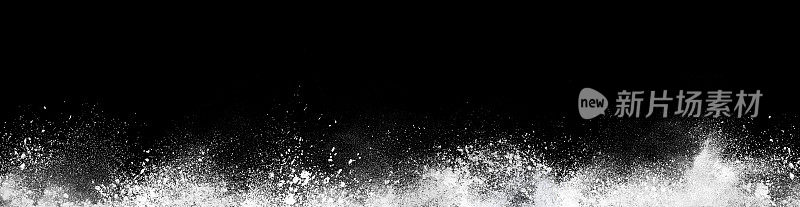 广泛设计的抽象粉末粉尘爆炸在黑色背景