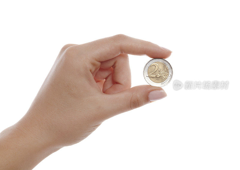 女人的手指拿着两枚孤立的欧元硬币