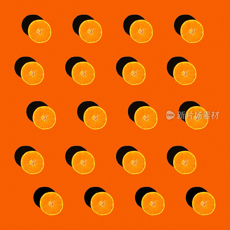 橙色水果在橙色基调的背景，鸟瞰图一排
