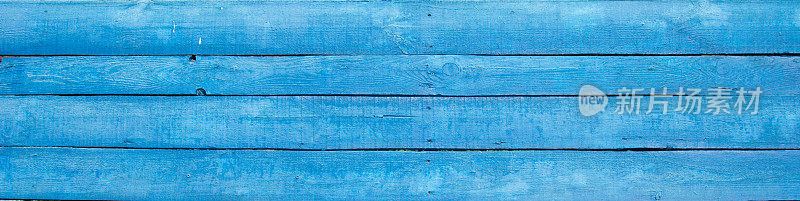 背景为蓝色油漆的木板，油漆过的木纹