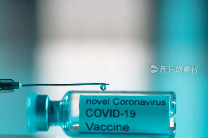 冠状病毒、Covid-19大流行疾病疫苗瓶和注射器的微缩照片