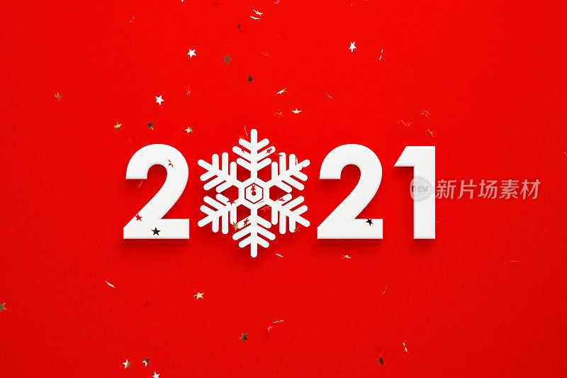 白色雪花在红色背景上形成2021年