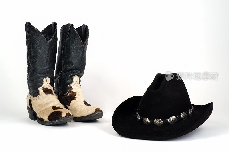 牛皮牛仔靴和帽子与Concho帽带。