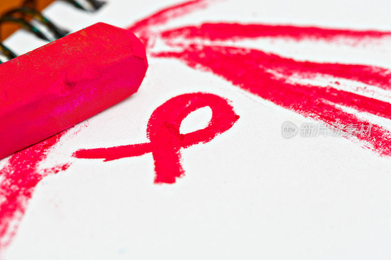 国际艾滋病丝带标志的红色蜡笔画
