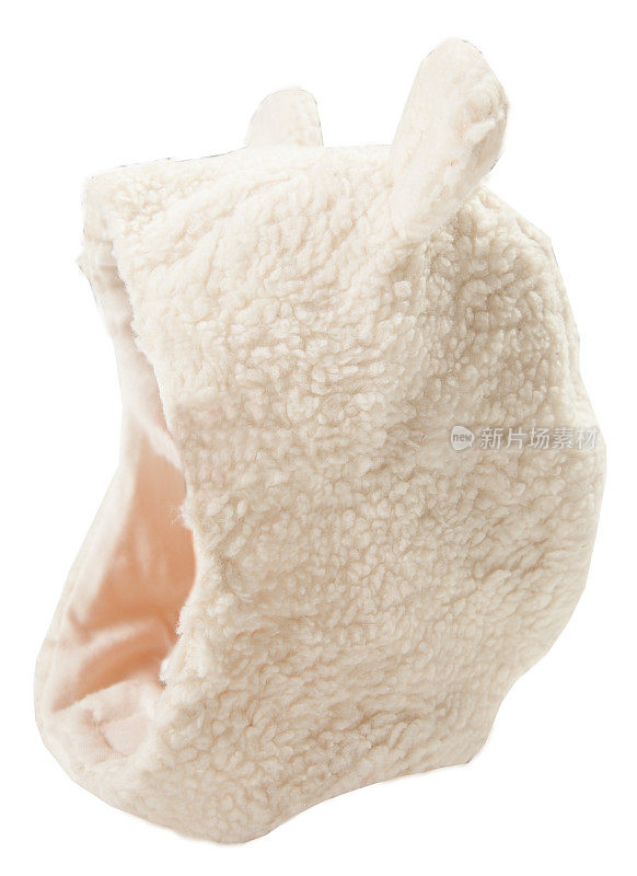 白色针织冬季羊毛帽子与绒球绒球和有趣的耳朵为婴儿