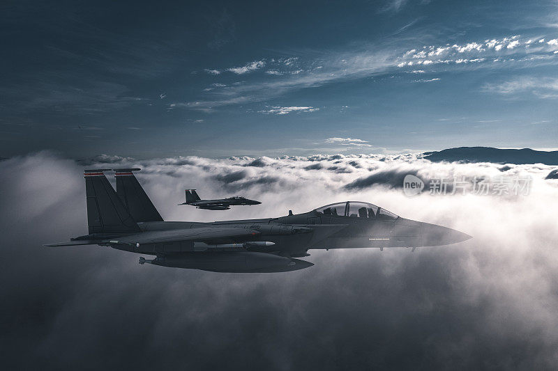 喷气式战斗机在云层上方飞行。