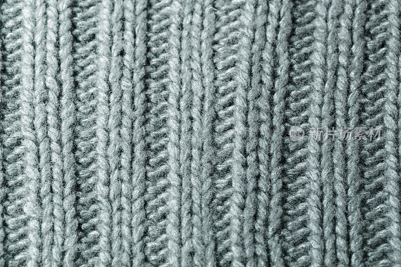 绿色罗纹或缆线针编织毛织背景