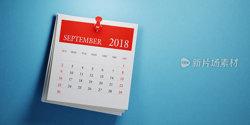 把九月的日历贴在蓝色的背景上