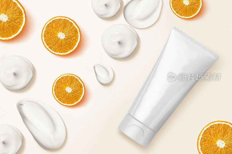 橙酸橙面霜和洗面奶用试管滴。洁面磨砂膏、洗面奶、精华液、沐浴露或液体皂滴。