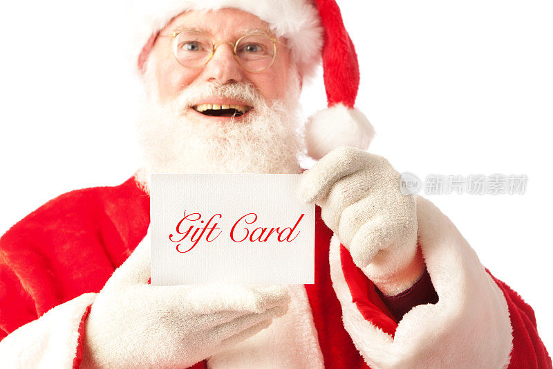 快乐的圣诞老人拿着礼物卡