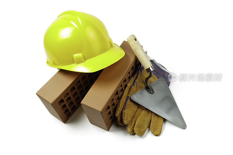 泥工工具:镘刀、砖、手套和头盔