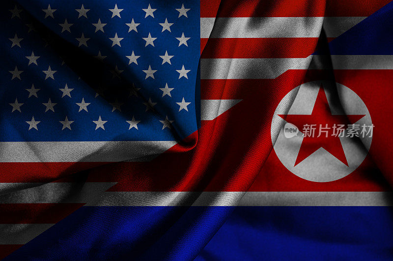 挥舞着朝鲜和美国的旗帜