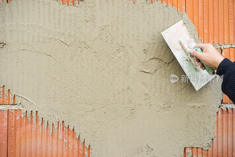 建筑工地砖墙抹灰工作的工业抹灰工