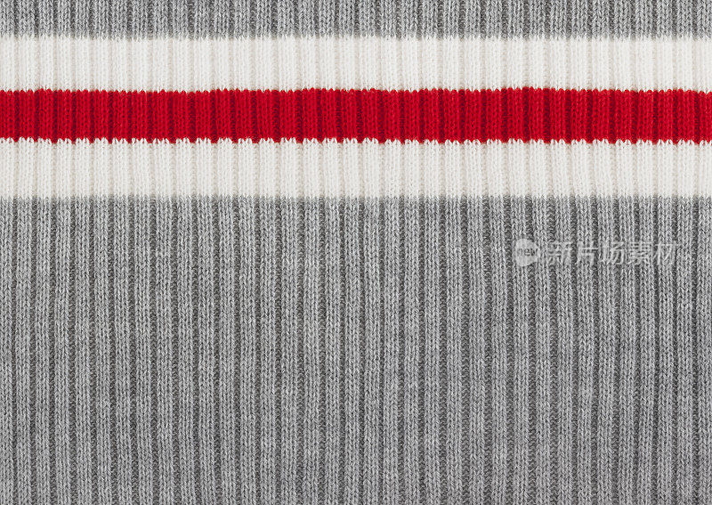 灰色，白色和红色条纹针织羊毛背景