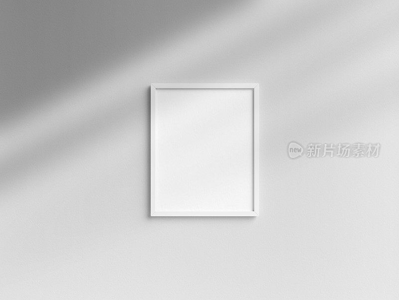 空白的8x10白色相框模板挂在墙上