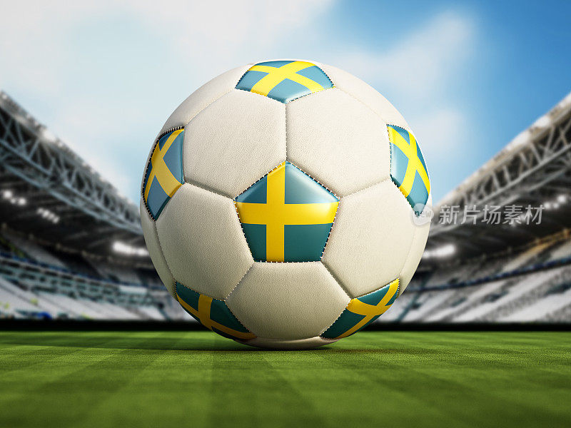 瑞典国旗(瑞典国旗)上的足球站在绿色的足球场