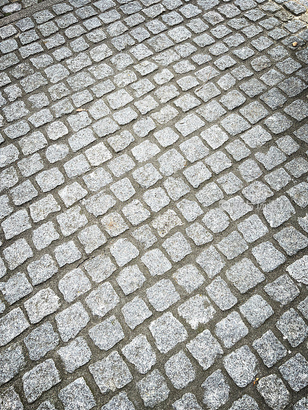 小的方形铺路石，有缝隙作为纹理或背景。
