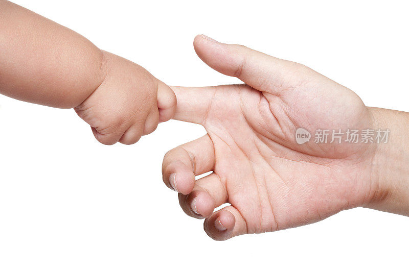 婴儿和成人手拉手