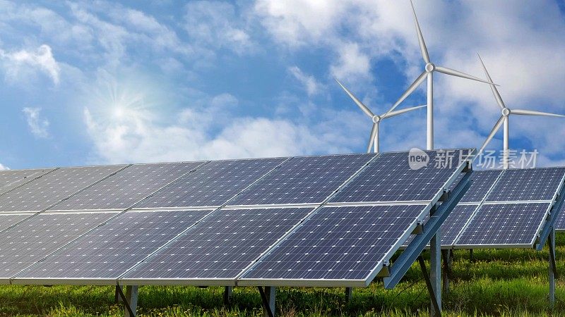 太阳能电池板和风力涡轮机作为可再生能源。