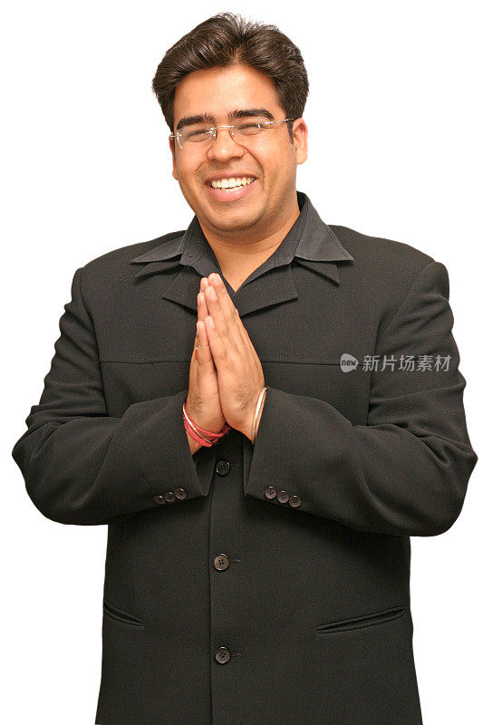 微笑的印度男子双手合十礼