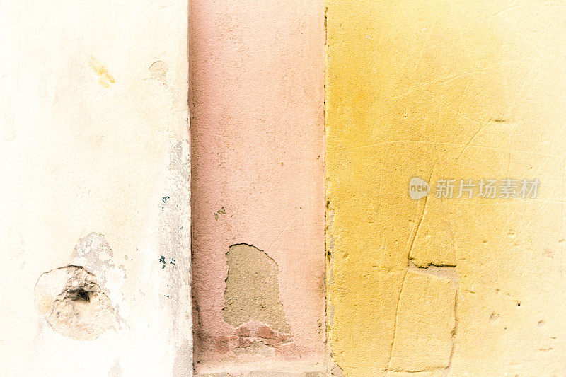 黄白粉斑驳的西西里墙背景纹理